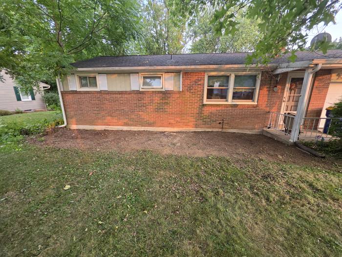 Wide view across the front of the home before the deck build — Richland, PA