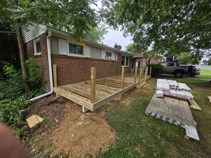 Railing posts set on finished deck framing ready for decking — Richland, PA