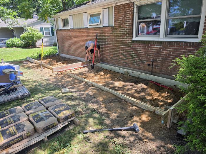 Deck layout marked and perimeter boards set during site preparation — Richland, PA deck build